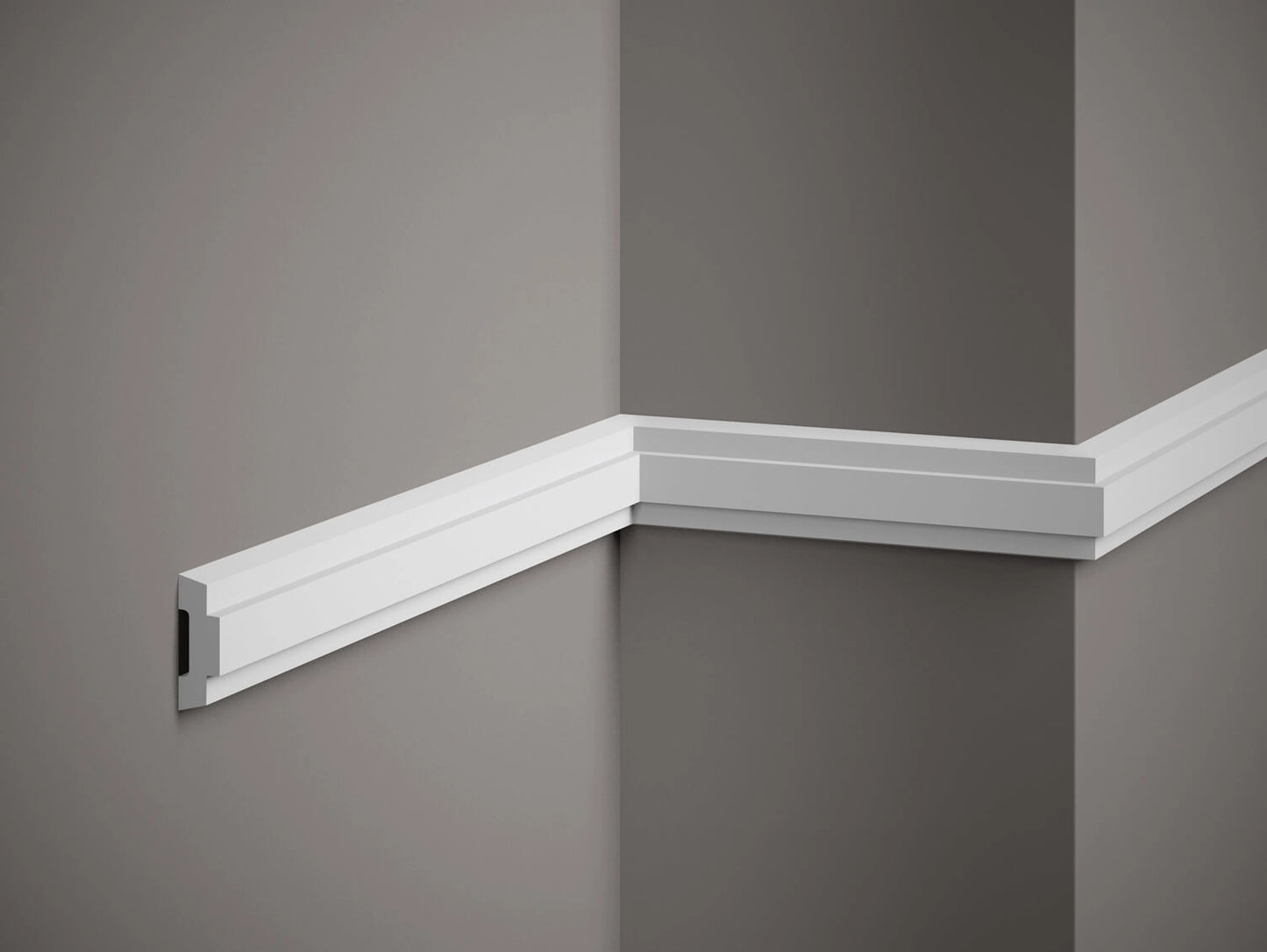 Moulure murale MD317 blanche installée sur un mur avec un angle, idéale pour une décoration intérieure moderne et raffinée