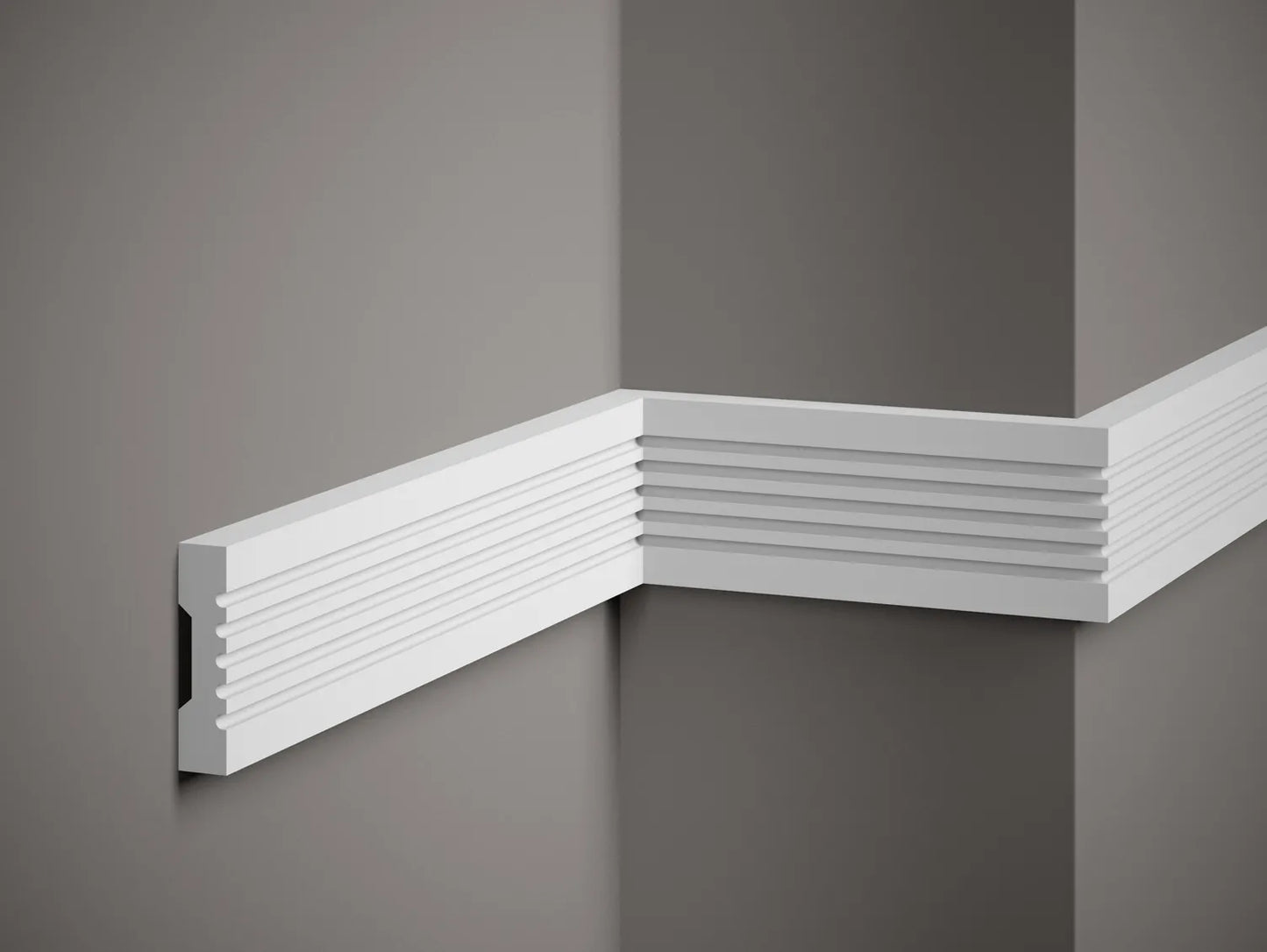Moulure murale MDD412 blanche installée dans un angle de mur, idéale pour une décoration intérieure moderne et élégante