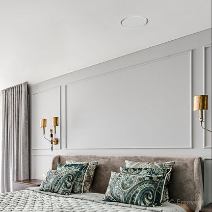 bouche de ventilation installer dans un plafond de chambre 