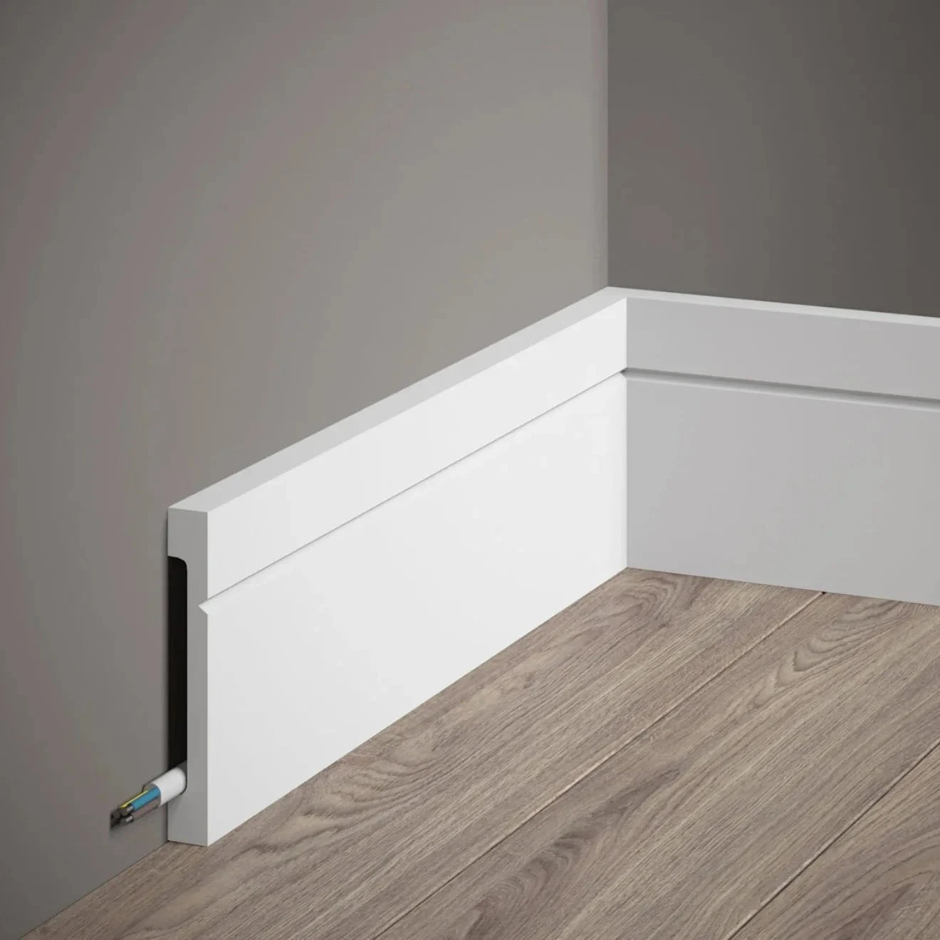 Plinthe décorative blanche MD356 avec cache câble intégré, idéale pour masquer les fils électriques et créer une finition murale moderne et élégante.
