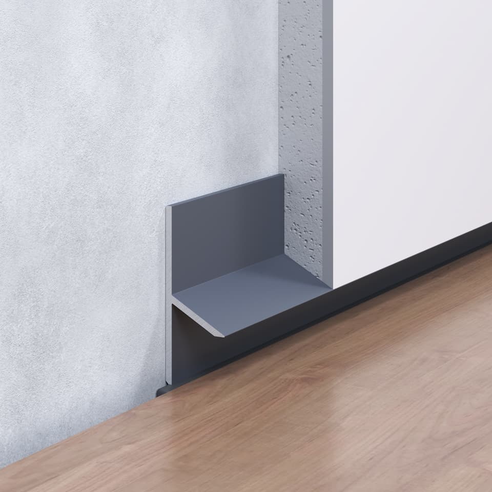 Profilé joint creux gris pour installation en pied de cloison sur sol, finition soignée et moderne