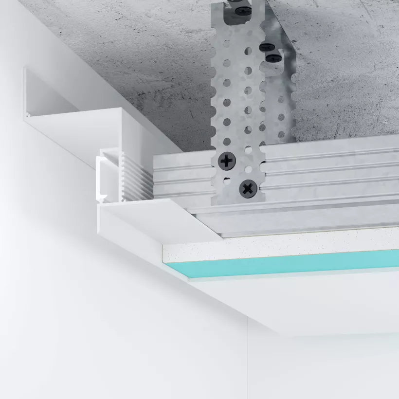 Vue en coupe du profilé LED blanc 40 mm pour éclairage indirect au plafond, intégré à une structure en placo. Solution idéale pour une lumière d’ambiance moderne