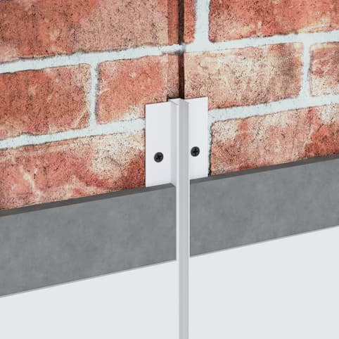 Profilé LED encastré en aluminium 10 mm fixé entre deux murs en brique, pour éclairage linéaire mural