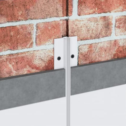 Profilé LED encastré en aluminium 10 mm fixé entre deux murs en brique, pour éclairage linéaire mural