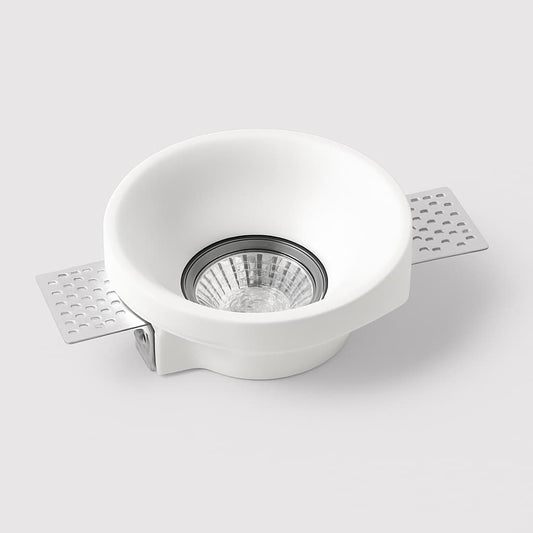 Spot invisible encastré en plâtre Ø100 mm, luminaire design à intégrer au plafond pour un éclairage moderne et discret.